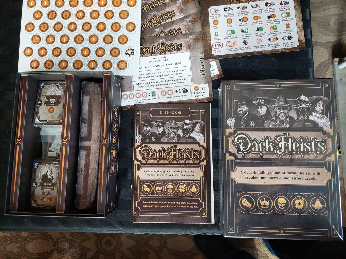 Dark Heists board game with metal coins