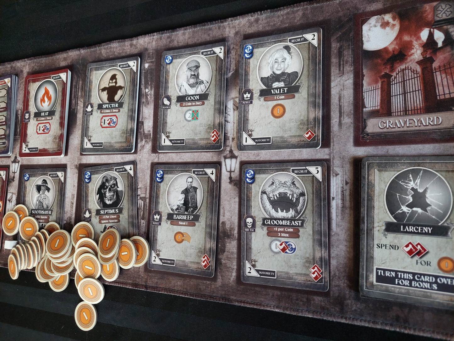 Dark Heists board game with metal coins