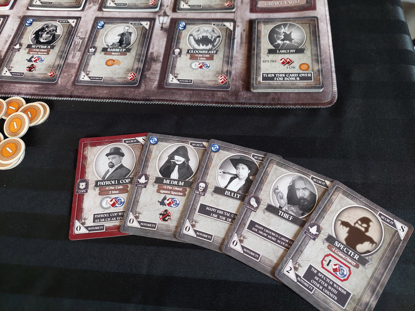 Dark Heists board game with metal coins